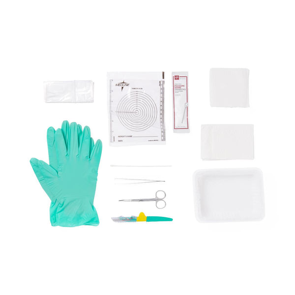 Medical Medline Debridement Tray Kit with gloves, bandages, and other supplies on a white background